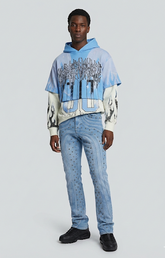 ice blue stacked jeans with bead studs,” “front view embellished stacked denim,” “men’s light wash stacked jeans with stud detailing